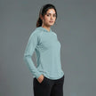 Women's full sleeves hooded shirt with reflective strips by ZAKWEAR, featuring a comfortable fit and functional reflective detailing.